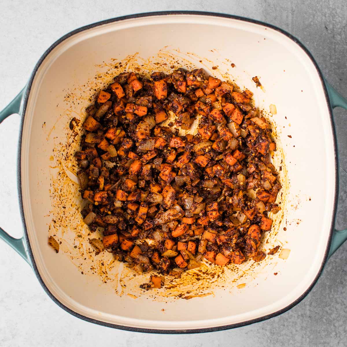 Seasonings mixed into the pot.